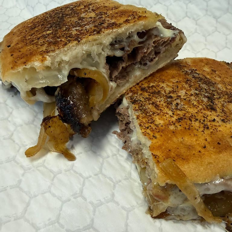 Indulge in Our Cheesesteak
