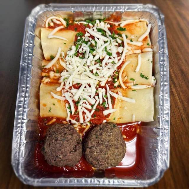 3 Piece Manicotti with 2 Meatballs and Marinara Sauce..